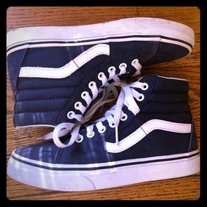 Vans high-top shoes.